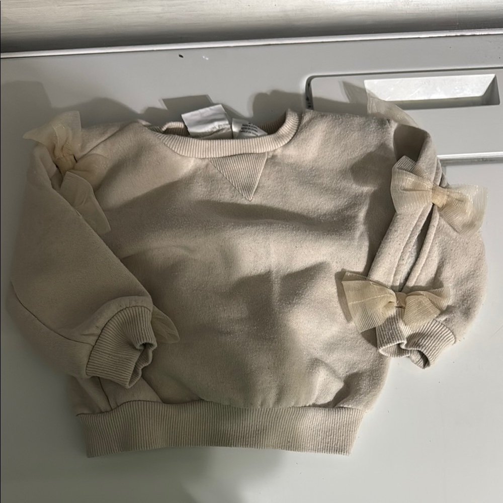 Cream Sweater with Bow Accents